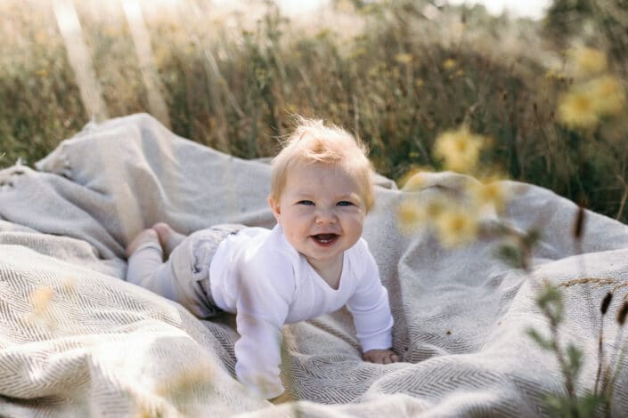 Baby boy smiling on the grass | Motherhood session | Family photography in Basingstoke | Hampshire | Ewa Jones Photography