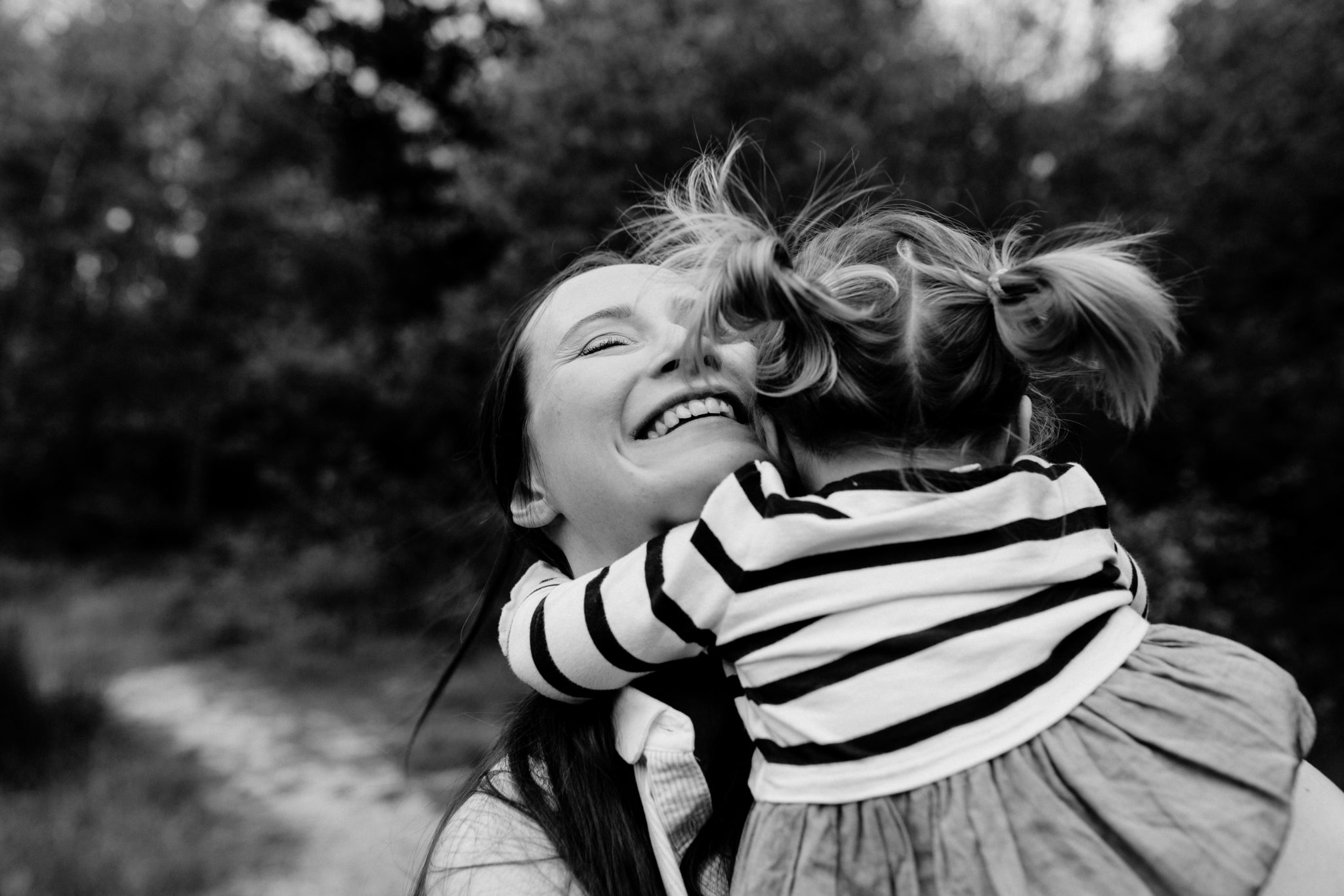 Black and white mum and girl hug | Pure happiness | Family lifestyle photography | Hampshire | Basigstoke | Ewa Jones Photography