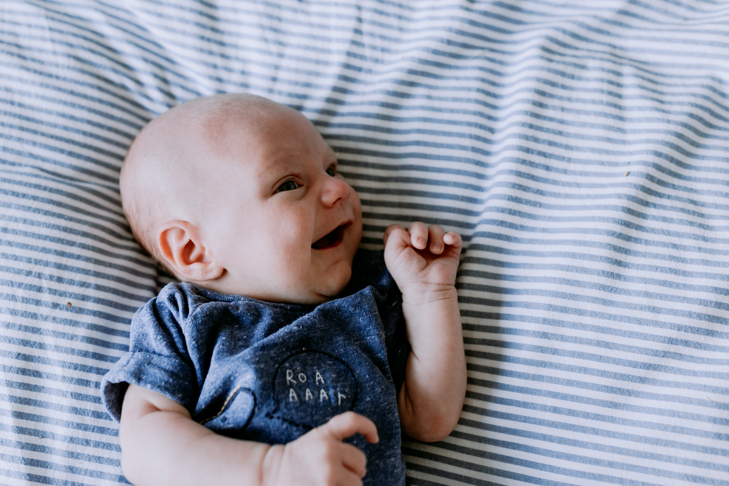 In home lifestyle newborn photo session | Newborn baby on bed |Hampshire newborn photography | Ewa Jones Photography