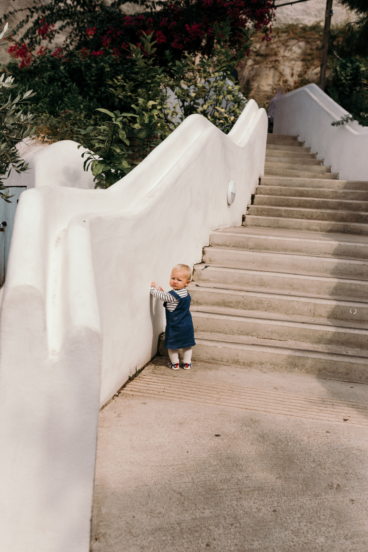 Girl standing next to the stairs by Ewa Jones Photography | Hampshire Photography