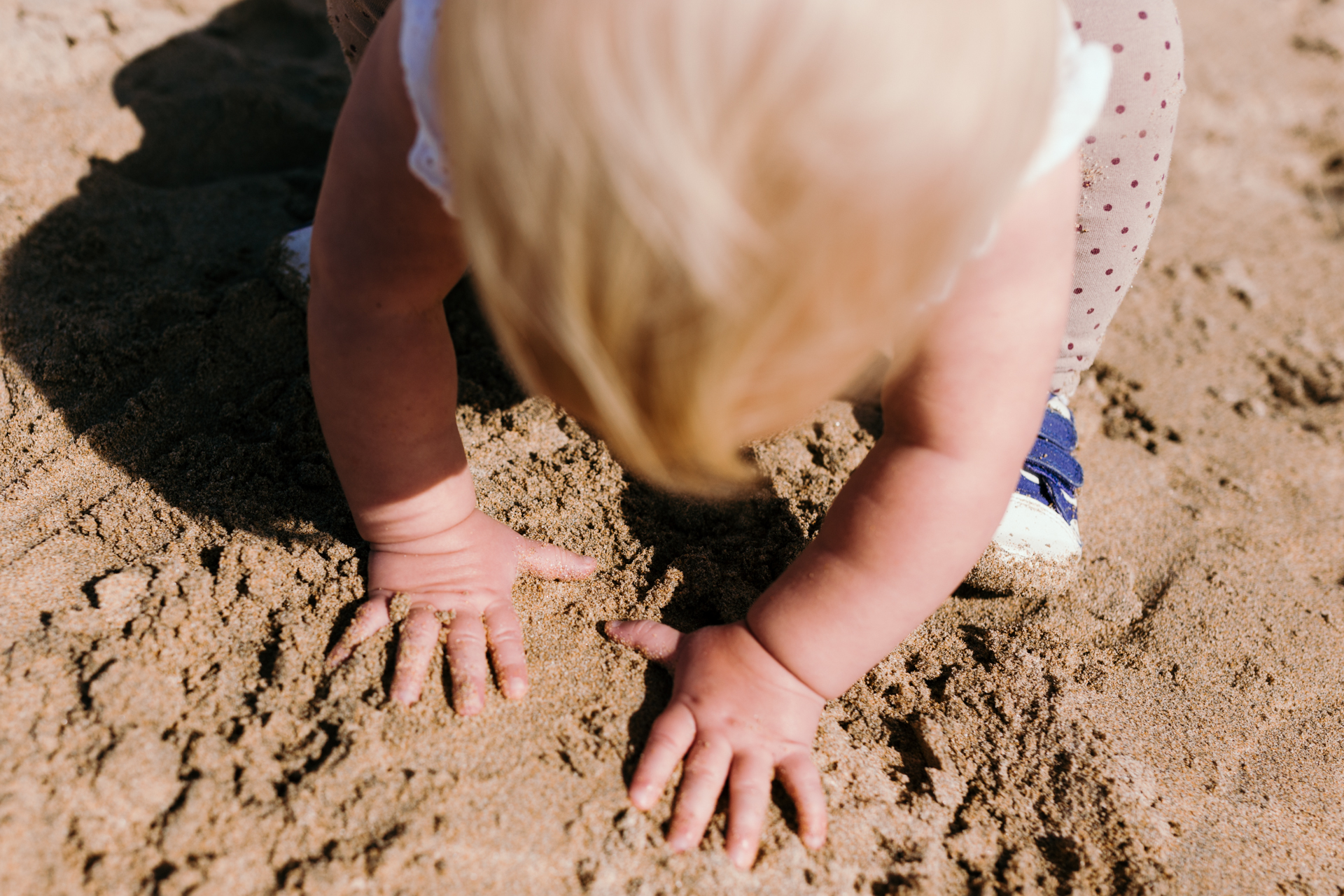 Girl playing with sand by Ewa Jones Photography | Basingstoke Photography