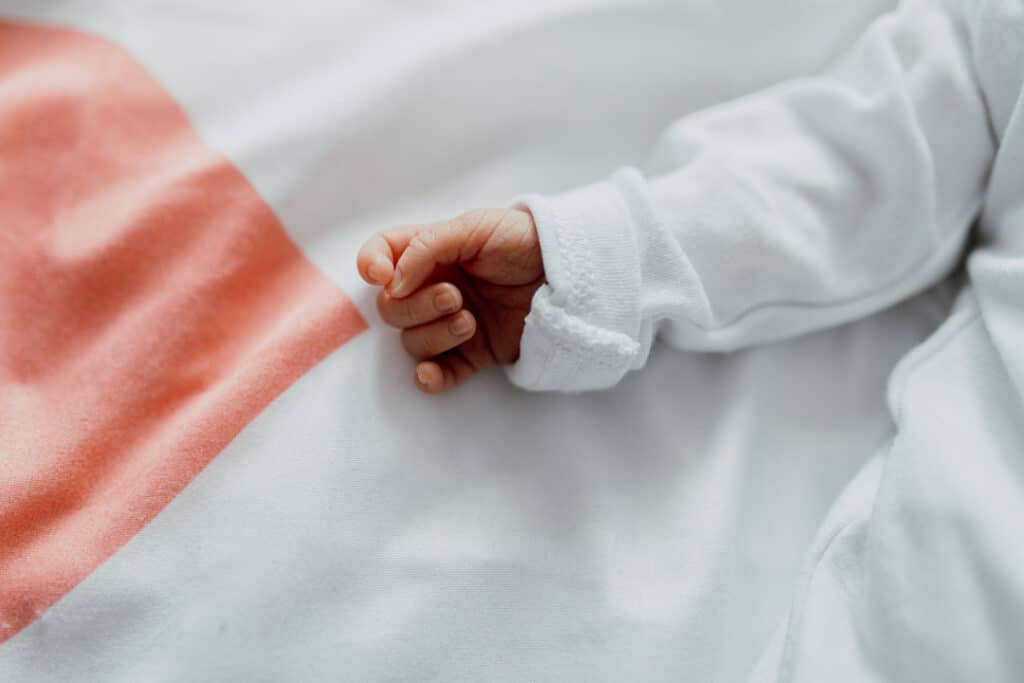 Close up detail of a newborn baby tiny hands. Newborn photographer in Basingstoke. Ewa Jones Photography