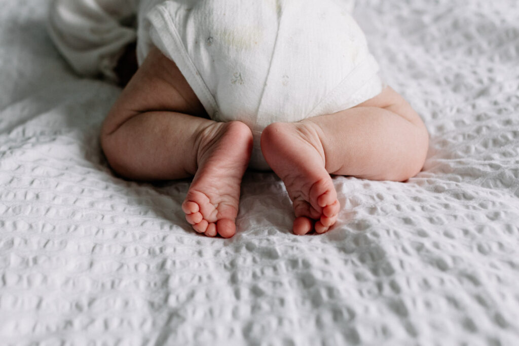 Close up detail of newborn baby feet. Natural lifestyle newborn photography in Hampshire. Ewa Jones Photography