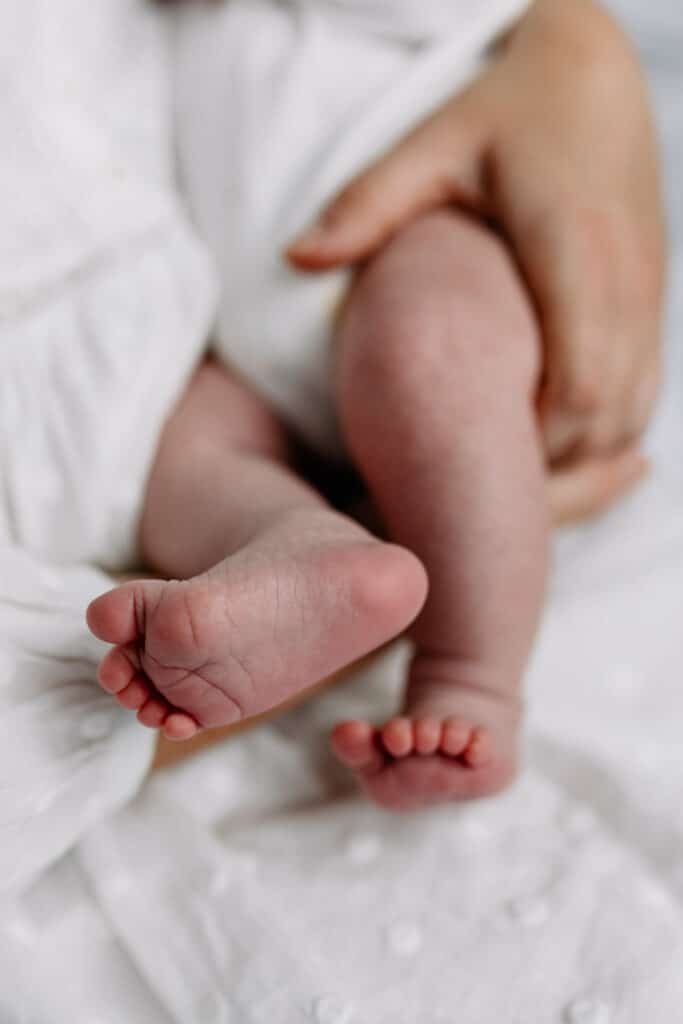 Close up detail of newborn baby feet. Natural lifestyle newborn photography in Hampshire. Ewa Jones Photography