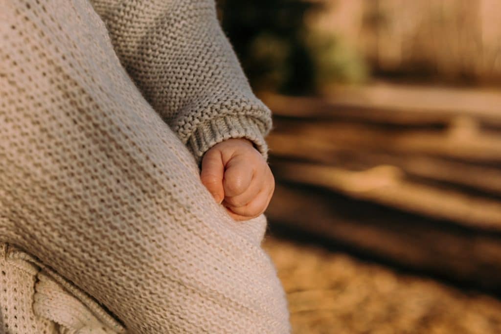 Close up detail of baby boy hands. Natural lifestyle photography in Hampshire. Ewa Jones Photography