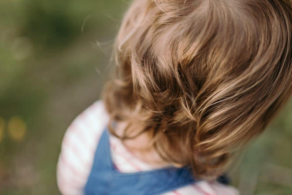 detail of little girl hair. lifestyle family photoshoot. Hampshire family photographer. Ewa Jones Photography