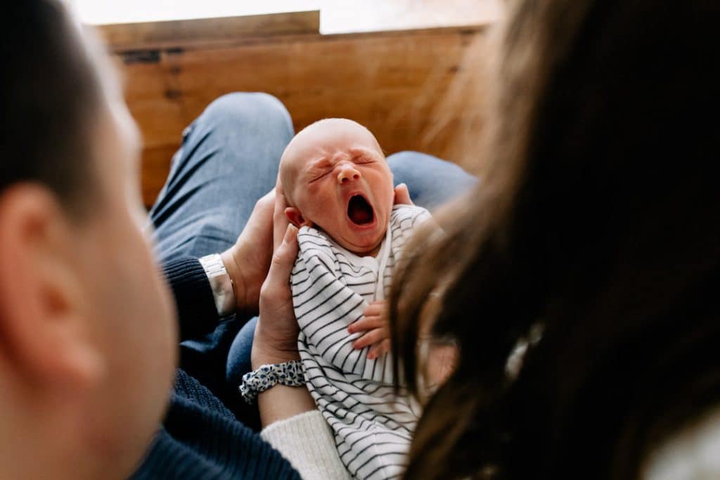 newborn baby yawn. Lifestyle newborn photoshoot in Hampshire. Ewa Jones Photography