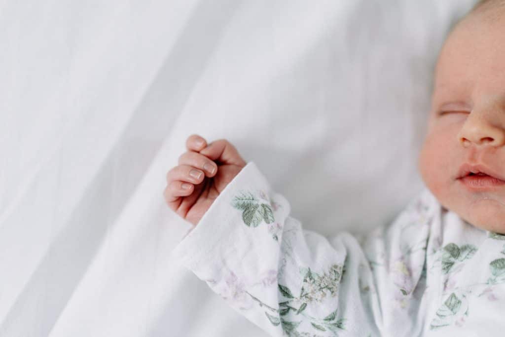 newborn baby hand detail. natural lifestyle newborn photo session in Fleet, hampshire. Ewa Jones Photography