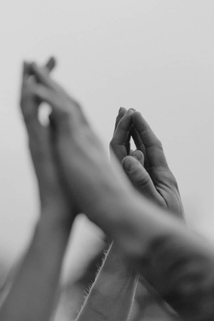 black and white image of hands in the air. couple photo session in Hampshire. Ewa Jones Photography