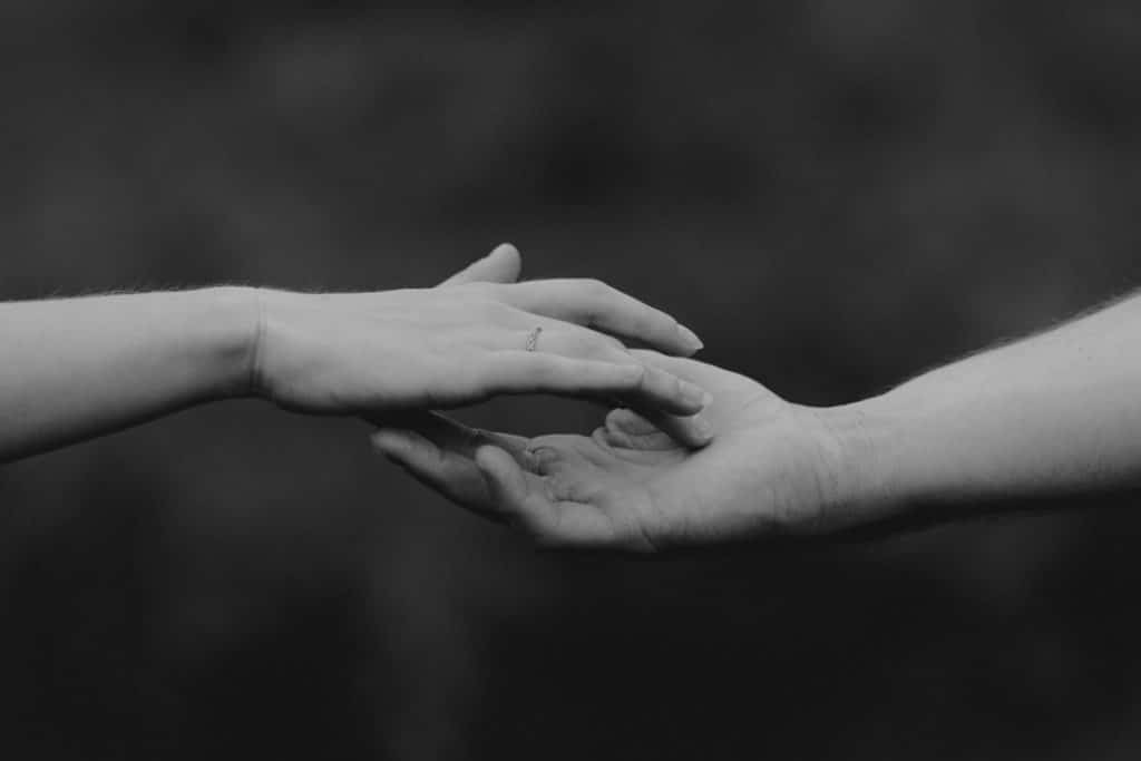 close up detail of couple touching their hands. black and white photograph. engagement photo session in Hampshire. Basingstoke photographer. Ewa Jones Photography