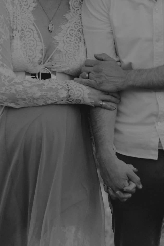 Maternity photo session - Grace and Chris-12 black and white image of expecting parents holding hands. maternity photo session in Hampshire. Ewa Jones Photography