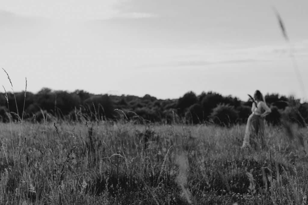 Maternity photo session - Grace and Chris-16 Black and white image of expectant mum standing in the field and looking away. maternity photoshoot. Basingstoke photographer. Ewa Jones Photography