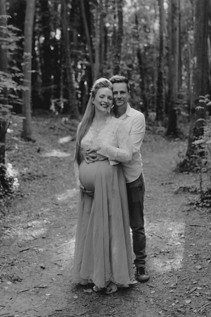 Maternity photo session - Grace and Chris-5 expecting couple is cuddling up and smiling to the camera. Hampshire photographer. maternity photography. Ewa Jones Photography