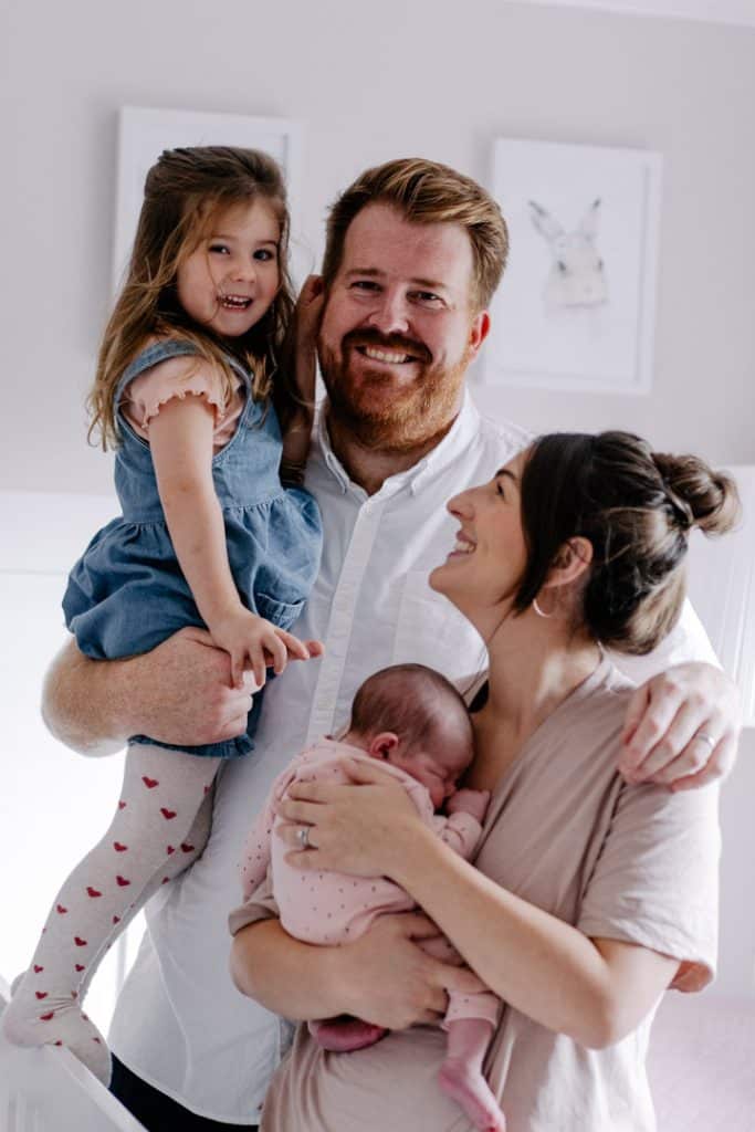 Family of four are looking happy. Maternity and newborn photoshoot. Newborn photoshoot in Basingstoke. Ewa Jones Photography