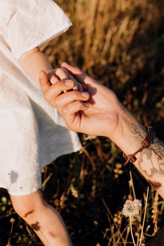 datails. dad is holding little girl hand. family photo shoot in Basingstoke. Hampshire. Ewa Jones Photography