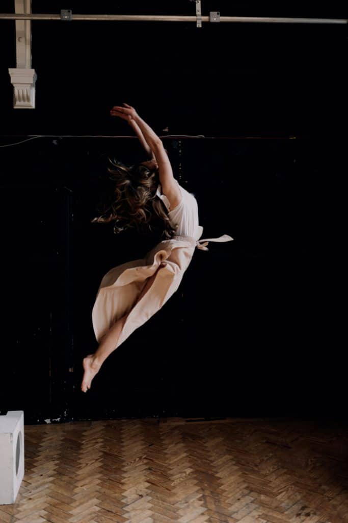 Female is jumping into the air. Female empowerment photoshoot. Model photography in Basingstoke Hampshire. Hampshire photographer. Ewa Jones Photography