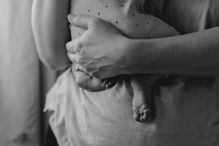 Newborn feet. black and white image. lifestyle newborn photoshoot. Hampshire photographer. Basingstoke newborn photographer. Ewa Jones Photography