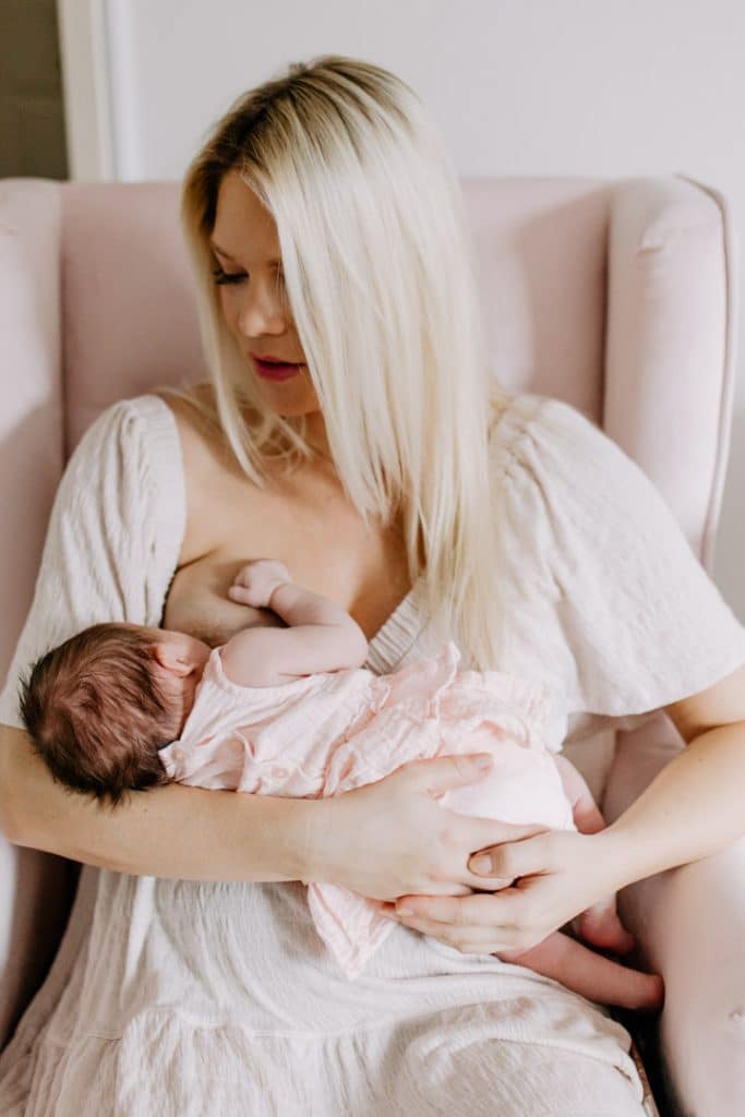 Newborn photo shoot in London-28 Mum is breastfeeding her baby girl. Newborn baby photo session. Hampshire photographer. Basingstoke newborn baby photographer. Ewa Jones photography.