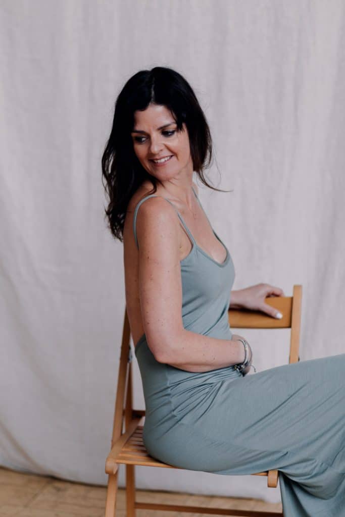 Empowering female sessions-36 Female is sitting on the chair and looking away. Women photo sessions. Ewa Jones Photography