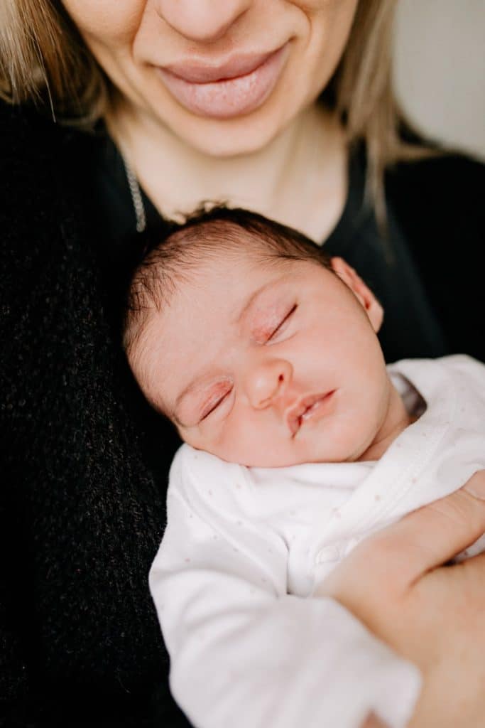 Close up image of newborn baby girl. Newborn photography in Hampshire. in home lifestyle photo sessions. Ewa Jones Photography
