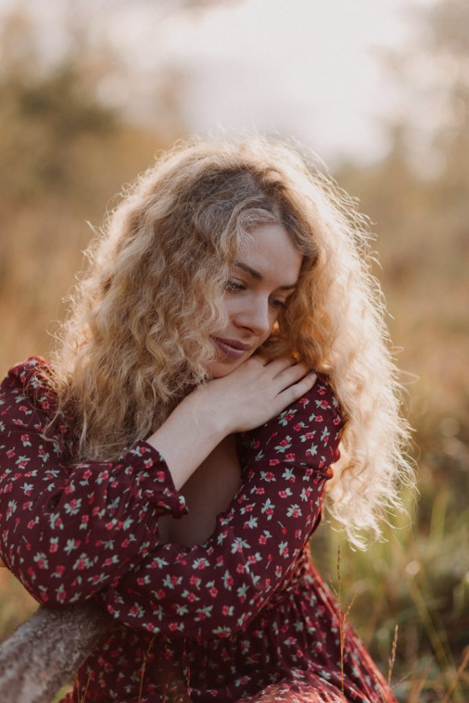 Lovely natural photo session of female sitting outdoors. Self love and beauty. Hampshire photographer. Ewa Jones Photography