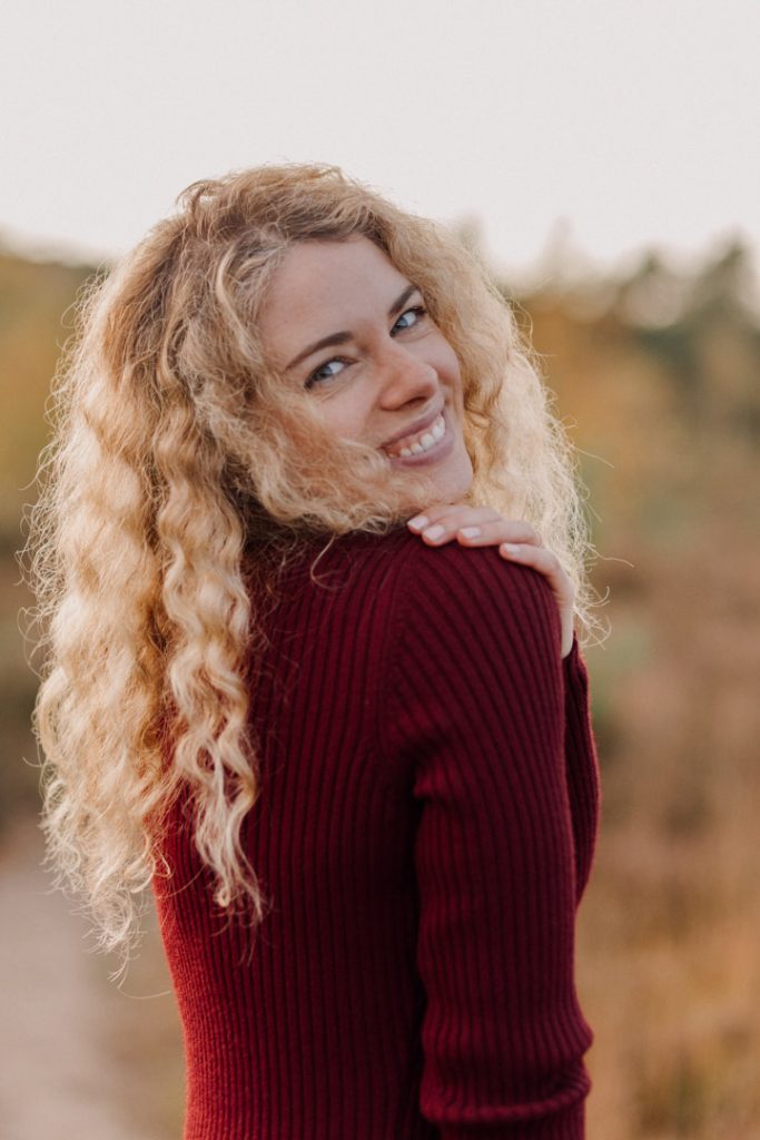 female is smiling and looking at the camera. female photo session. Hampshire photographer. Empowerment session. Basingstoke photo shoot. Ewa Jones Photography