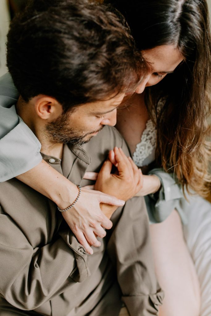intimate photo of expecting parents cuddling. Maternity photo shoot. Ewa Jones Photography
