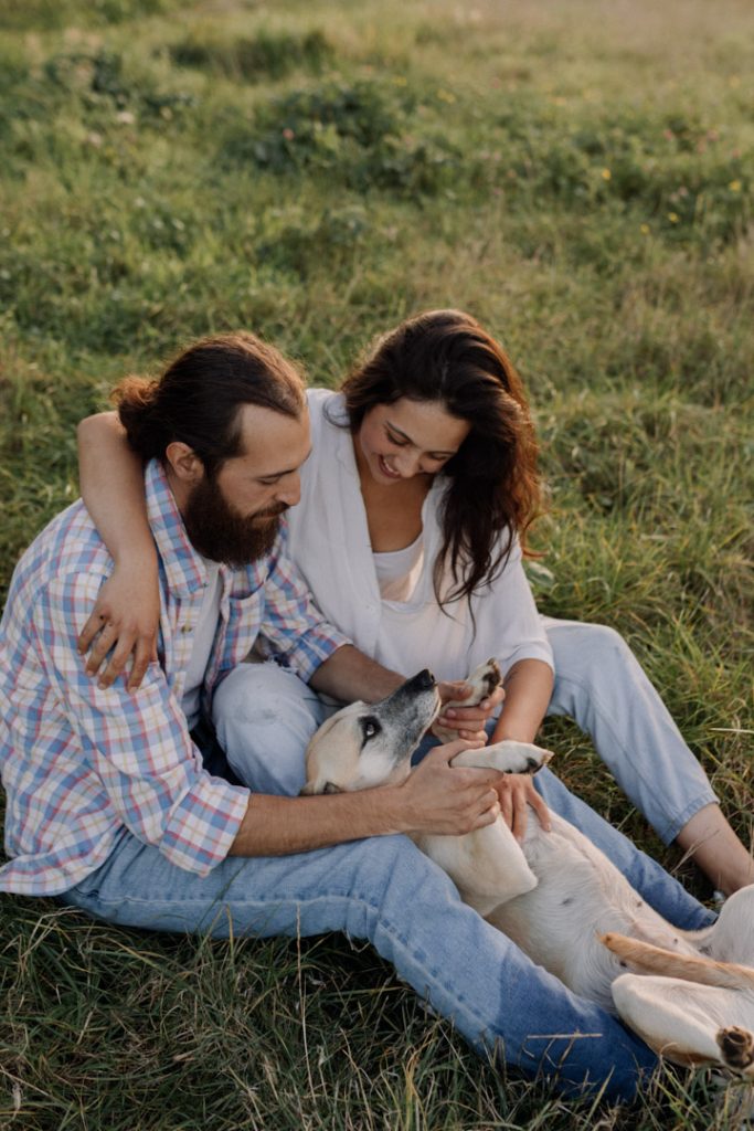 Couple is enjoying time together during photo session. Hampshire photographer. Photo session with dog. Ewa Jones Photography