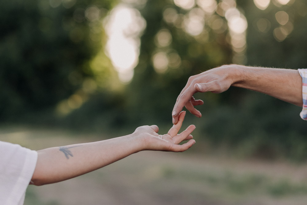 Close up picture of couple touching hands. Natural photo shoot. Hampshire photographer. Ewa Jones Photography
