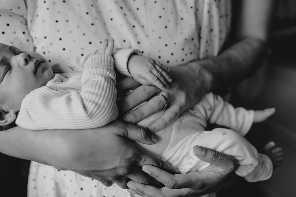 Black and white image, close up of baby hands and feet. Newborn shoot. Hampshire newborn photographer. Ewa Jones Photography